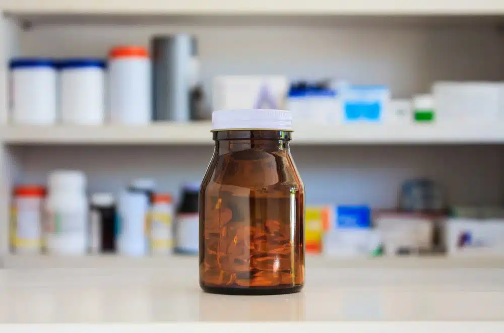 brown medicine bottle on the counter in pharmacy store